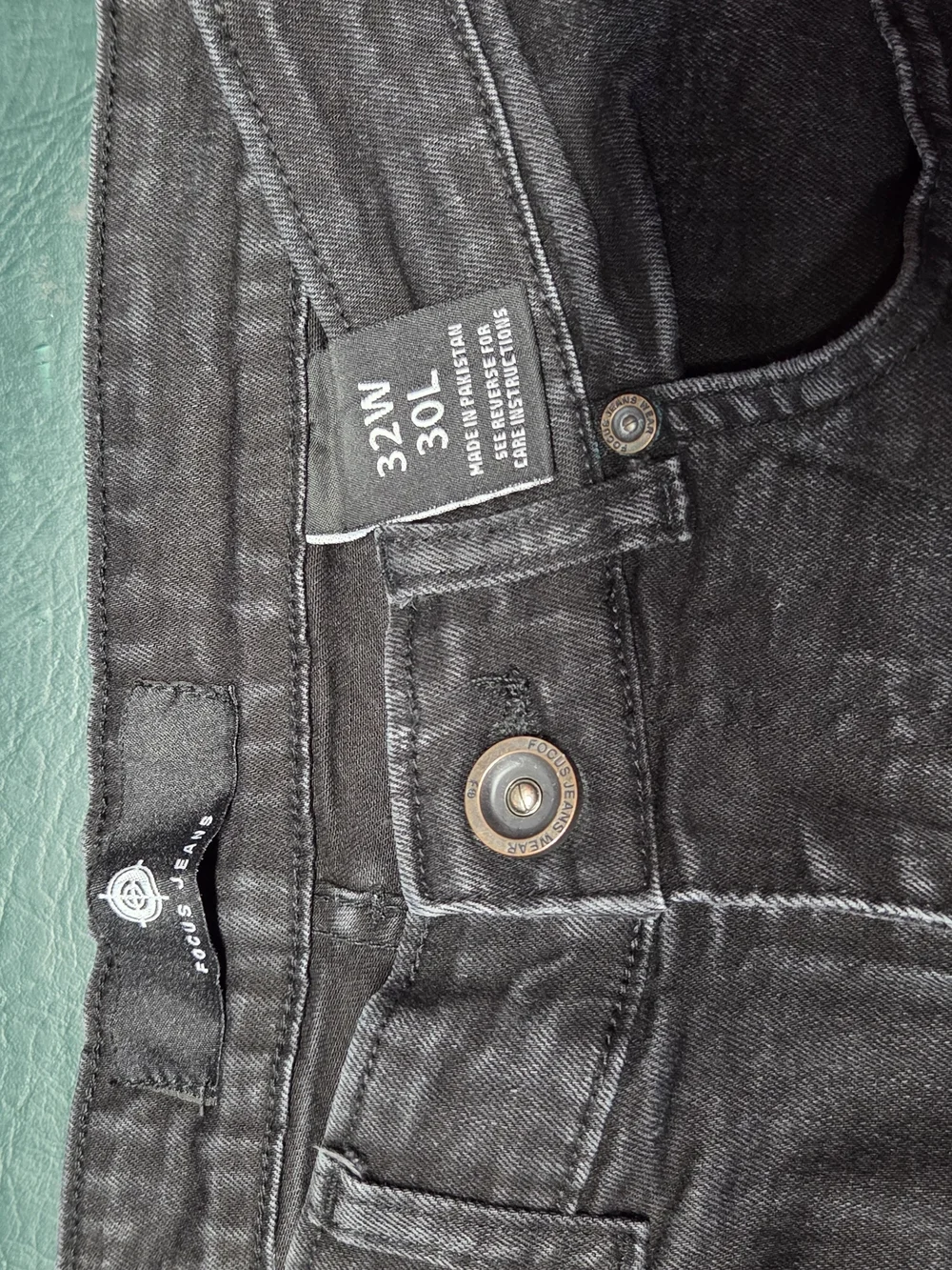 **Black Distressed Men’s Jeans with Color Patch Accents** - Picture 9 of 14